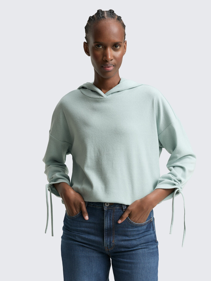 locker geschnittenes langarmshirt mit kapuze