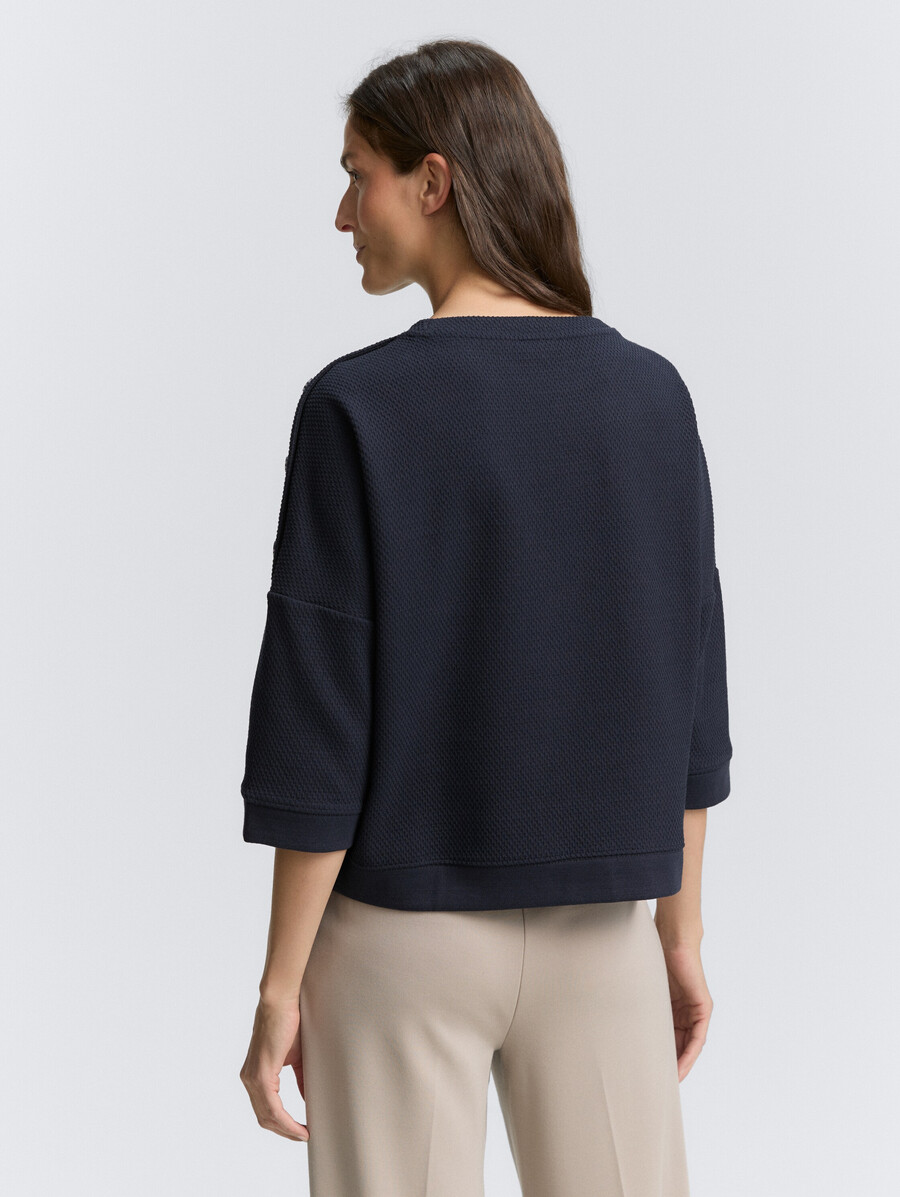 sweatshirt mit knopfdetails