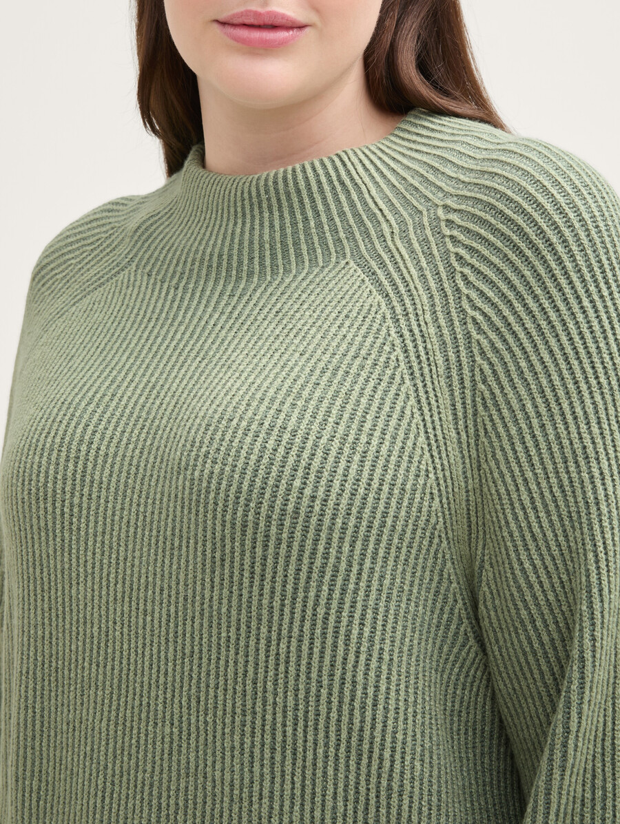 Übergröße – strickpullover mit stehkragen
