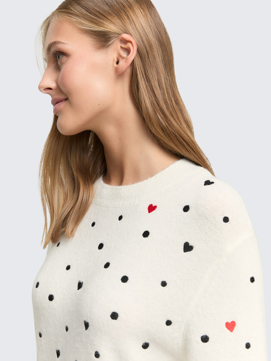 lässiger strickpullover mit stickerei