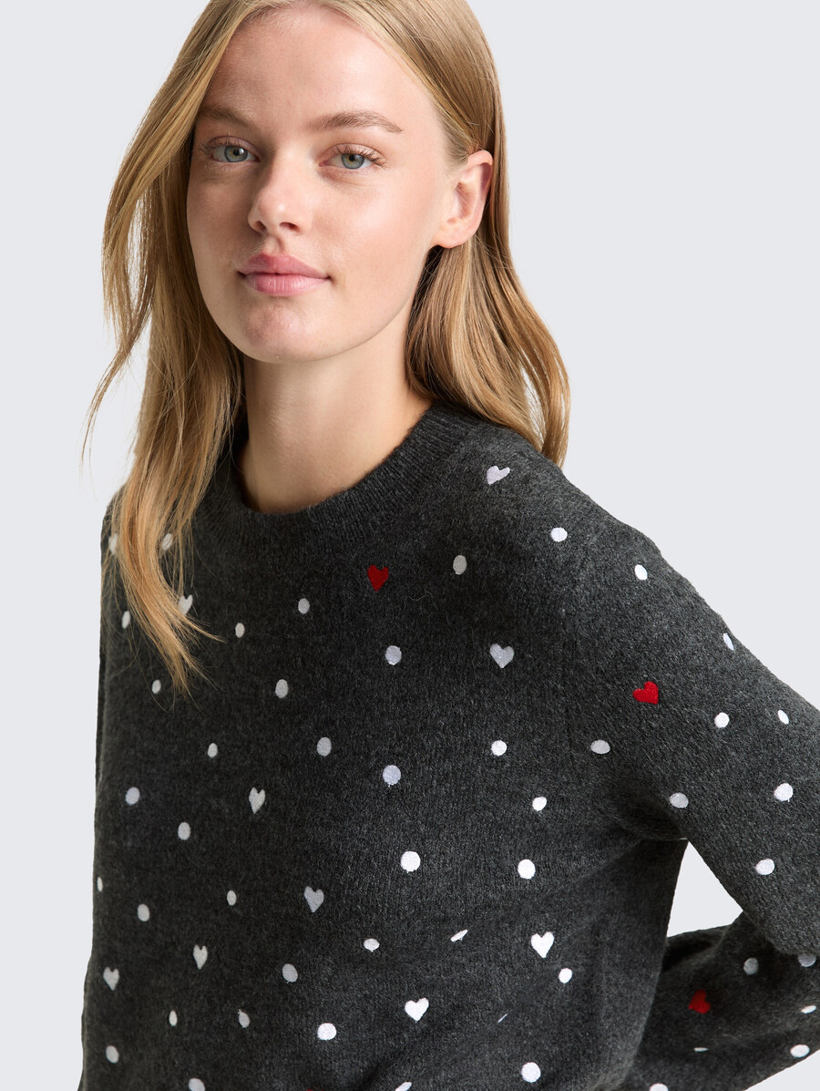lässiger strickpullover mit stickerei