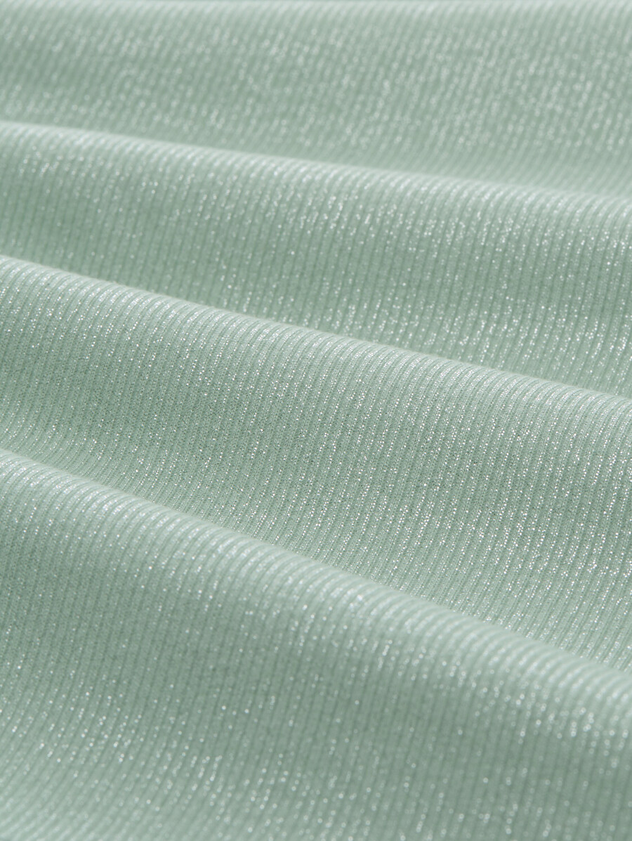 beschichtetes rippstrickoberteil mit glitzereffekt